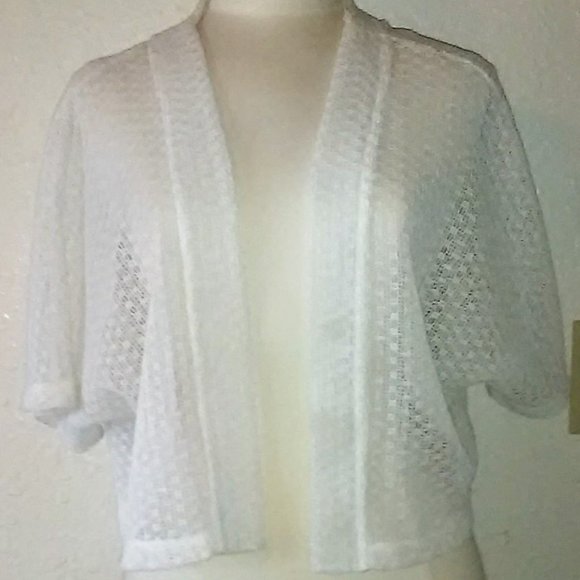 white shrug sweater